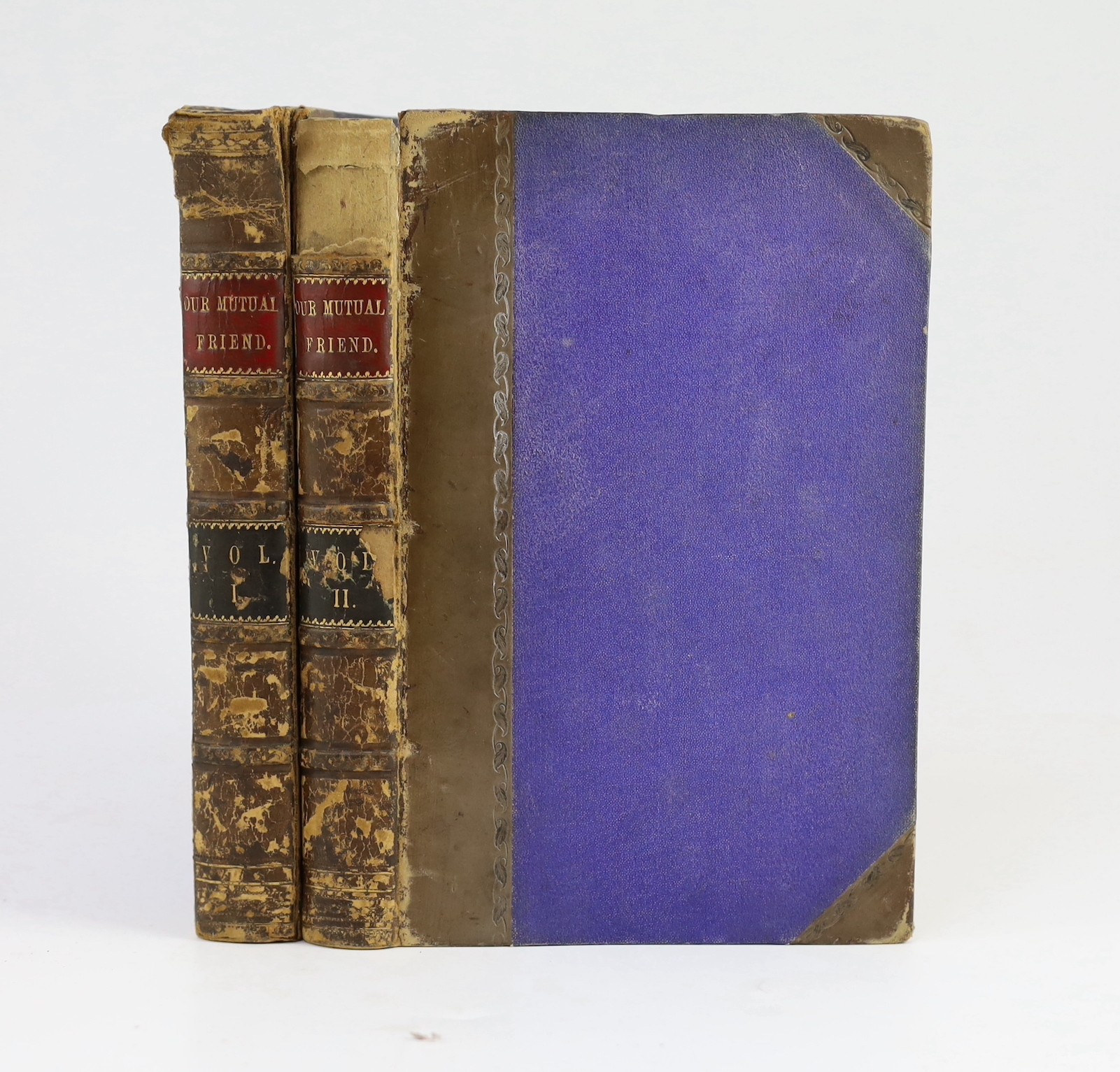 Dickens, Charles - Our Mutual Friend, 1st edition in book form, 2 vols, 8vo, quarter calf, cloth boards, illustrated with 40 plates by Marcus Stone, loss to upper section of vol.2 spine, tear to upper section Vol. 1 spin